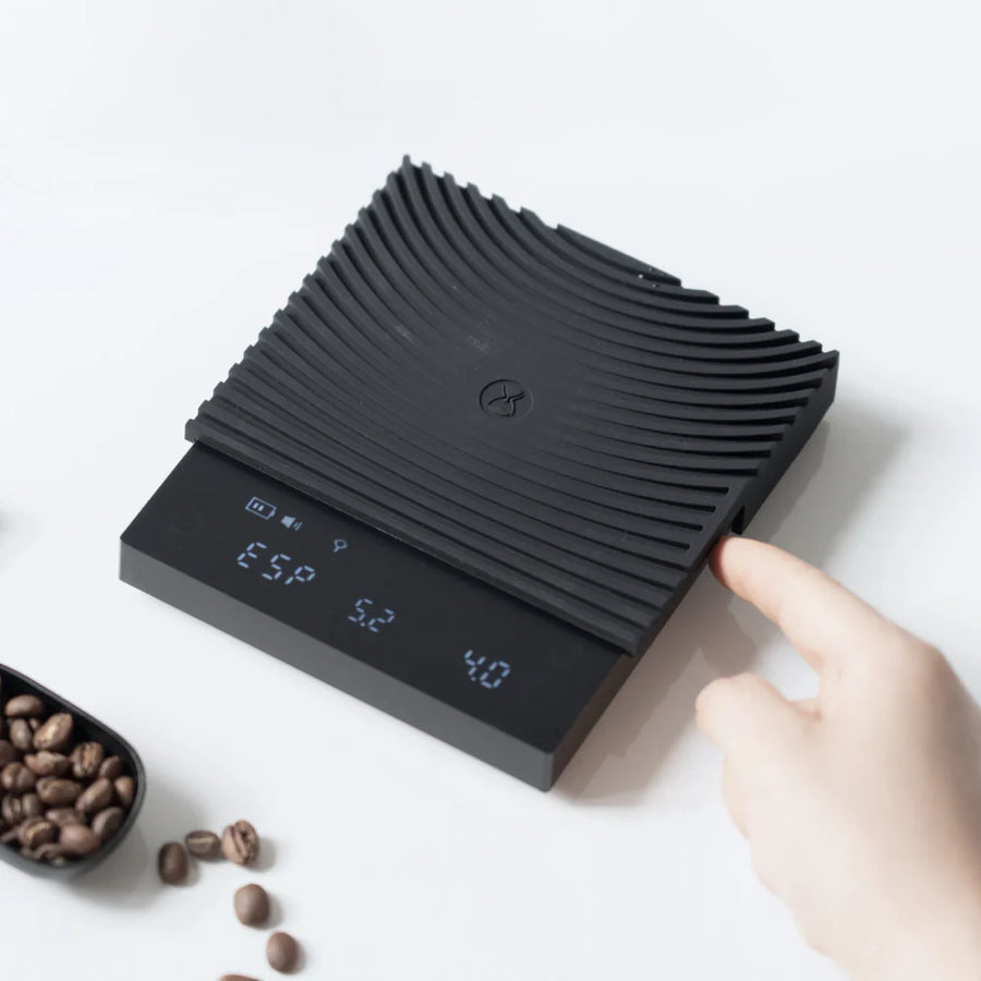 Timemore Basic 3.0 coffee scale in Espresso Mode showing shot weight and timer readout with coffee beans alongside
