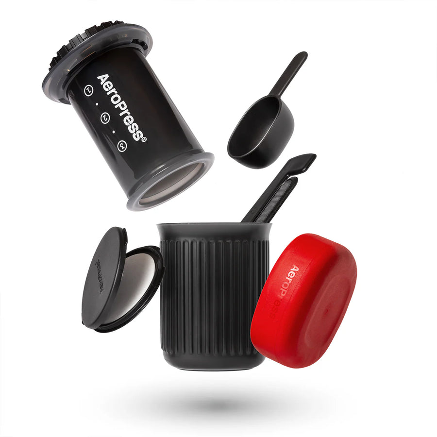 AeroPress Go Travel Brewer - Accessories Exploded View (Scoop, Travel Filters, Cup, Stirrer, Silicone Cap)