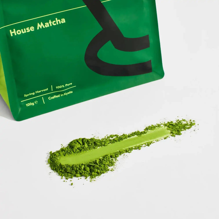 Close-up of Good & Proper House Matcha powder showing fine stone-ground texture.