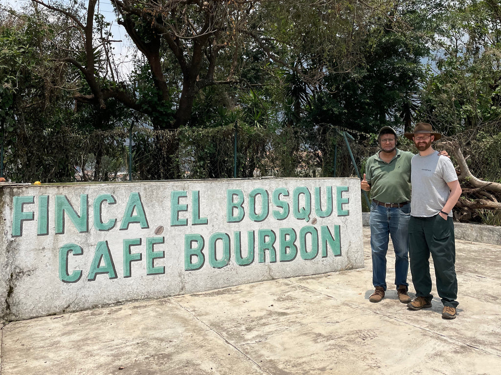 Francisco Flores and Hasbean Green Buyer Roland Glew at El Bosque in Amatitlán, GuatemalaEdit alt text