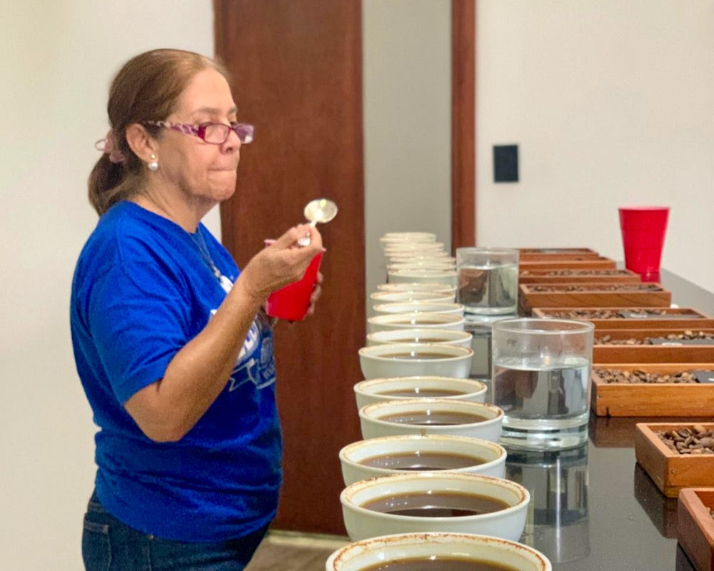 Gloria Rodriguez cupping in her lab at her farm Finca San José in Ahuachapán, El Salvador