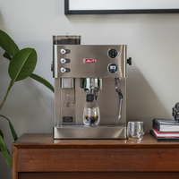 Lelit Kate PL82T home espresso machine side profile showing grinder and bean hopper