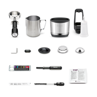 Sage BES985 Oracle Jet included accessories: portafilter, milk jug, filter baskets, and cleaning kit